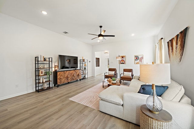 10722 Sky Creek Ln, Beasley, TX 77417 - living room featuring ceiling fan, light wood-style flooring, and recessed lighting