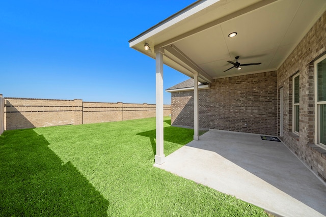 10722 Sky Creek Ln, Beasley, TX 77417 - view of yard featuring a ceiling fan and a patio