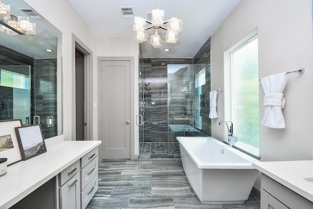 4292 Childress St, Houston, TX 77005 - full bathroom with vanity, a chandelier, a soaking tub, a shower stall, and recessed lighting