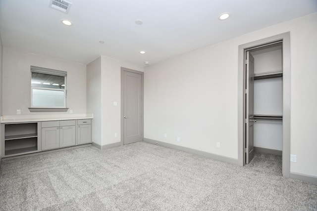 4292 Childress St, Houston, TX 77005 - unfurnished bedroom featuring carpet, recessed lighting, and a walk in closet