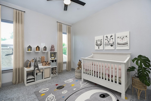 4292 Childress St, Houston, TX 77005 - carpeted bedroom featuring multiple windows, a crib, and ceiling fan