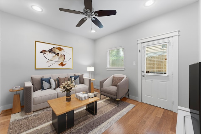 5739 Petty St, Houston, TX 77007 - living area featuring light wood finished floors, a ceiling fan, and recessed lighting