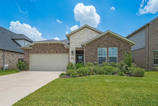 8439 Oakland Heights Ln, Richmond, TX 77407 - view of front of property with a garage, a front lawn, driveway, brick siding, and stone siding
