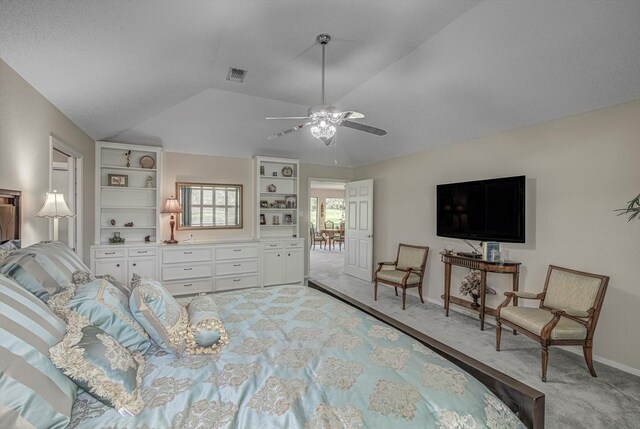 332 N Amherst Dr, West Columbia, TX 77486 - bedroom featuring light carpet, vaulted ceiling, and a ceiling fan
