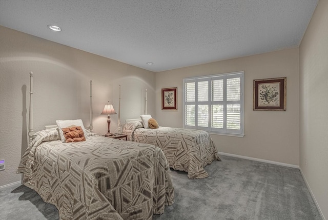 332 N Amherst Dr, West Columbia, TX 77486 - bedroom featuring carpet, a textured ceiling, and recessed lighting