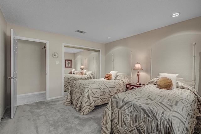 332 N Amherst Dr, West Columbia, TX 77486 - carpeted bedroom featuring a closet and recessed lighting