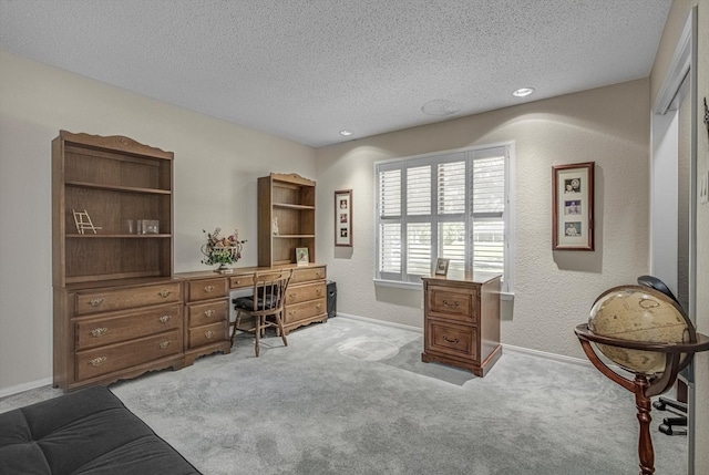 332 N Amherst Dr, West Columbia, TX 77486 - carpeted office space with a textured ceiling and baseboards