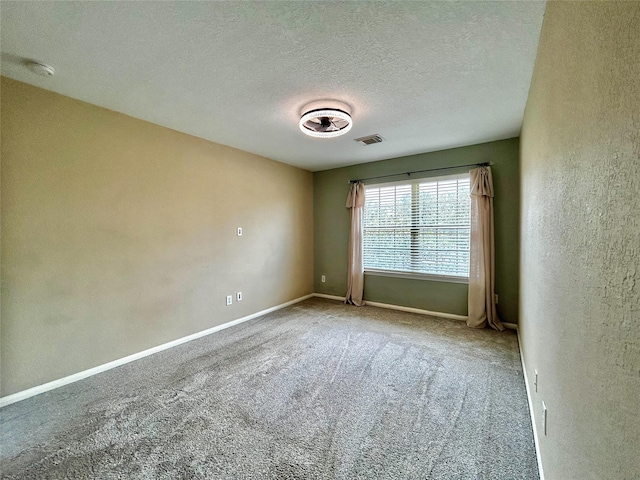 2110 Sterling Oaks Dr, Rosharon, TX 77583 - carpeted empty room with a textured ceiling and a smoke detector