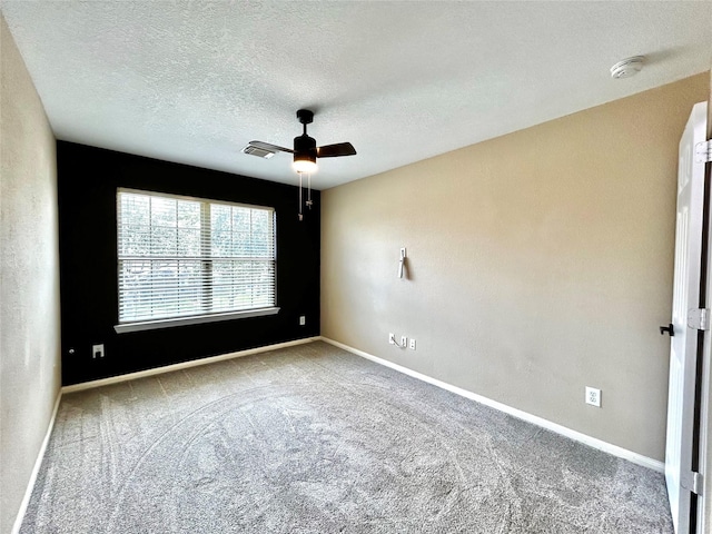 2110 Sterling Oaks Dr, Rosharon, TX 77583 - unfurnished room with a smoke detector, ceiling fan, carpet, and a textured ceiling