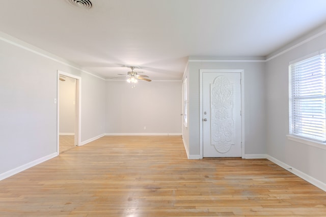6609 Imogene St, Houston, TX 77074 - unfurnished room featuring ceiling fan, ornamental molding, and light wood finished floors