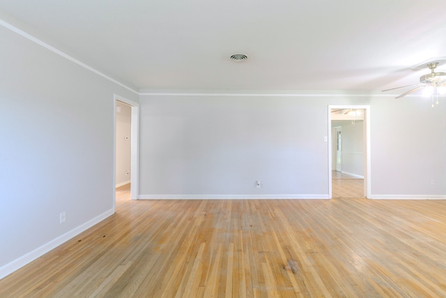 6609 Imogene St, Houston, TX 77074 - empty room with light wood-style floors, a ceiling fan, and crown molding