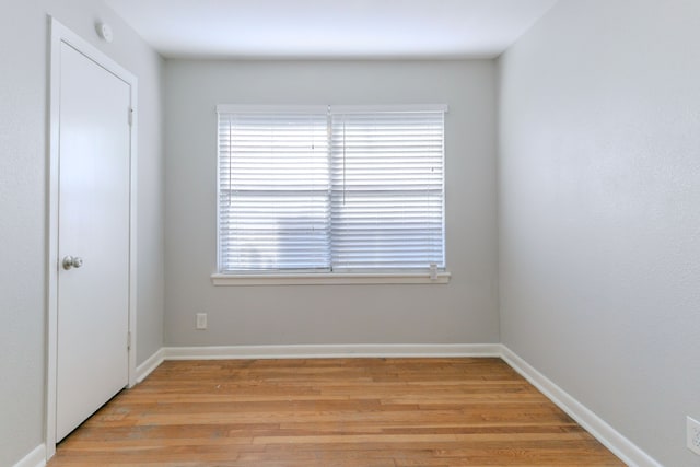 6609 Imogene St, Houston, TX 77074 - spare room featuring light wood finished floors and a smoke detector