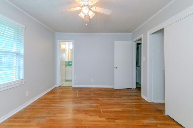 6609 Imogene St, Houston, TX 77074 - unfurnished room with a ceiling fan, crown molding, and light wood-type flooring