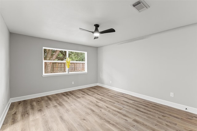 10503 Long River Dr, Sugar Land, TX 77498 - spare room with ceiling fan and wood finished floors
