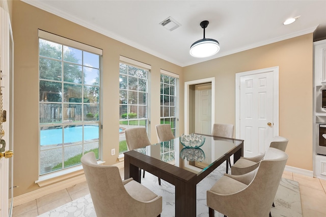 1922 Briarchester Dr, Katy, TX 77450 - dining room featuring crown molding and light tile patterned floors