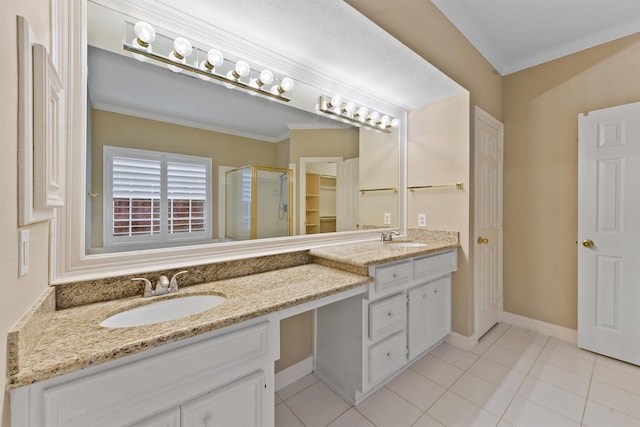 1922 Briarchester Dr, Katy, TX 77450 - bathroom with a stall shower, double vanity, tile patterned flooring, and ornamental molding