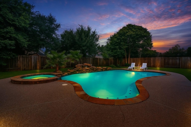 1922 Briarchester Dr, Katy, TX 77450 - view of swimming pool featuring a patio, a fenced backyard, and a pool with connected hot tub