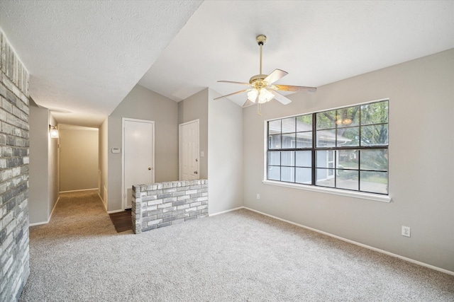 2850 Pheasant Run, Humble, TX 77396 - unfurnished room with a ceiling fan, carpet, and lofted ceiling