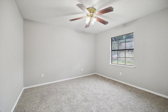 2850 Pheasant Run, Humble, TX 77396 - carpeted empty room with a ceiling fan and a textured ceiling