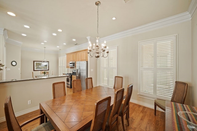 4009 Bellefontaine St, Houston, TX 77025 - dining room featuring a chandelier, ornamental molding, light wood-type flooring, recessed lighting, and healthy amount of natural light