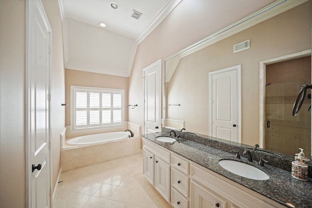 4009 Bellefontaine St, Houston, TX 77025 - bathroom featuring a garden tub, double vanity, crown molding, tile patterned floors, and a shower stall
