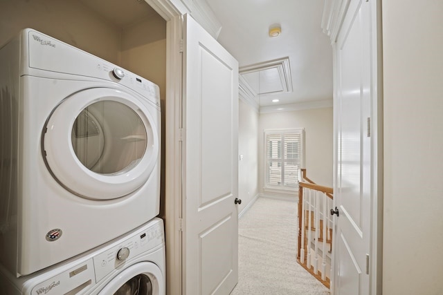 4009 Bellefontaine St, Houston, TX 77025 - laundry room with stacked washing machine and dryer, attic access, crown molding, and carpet floors