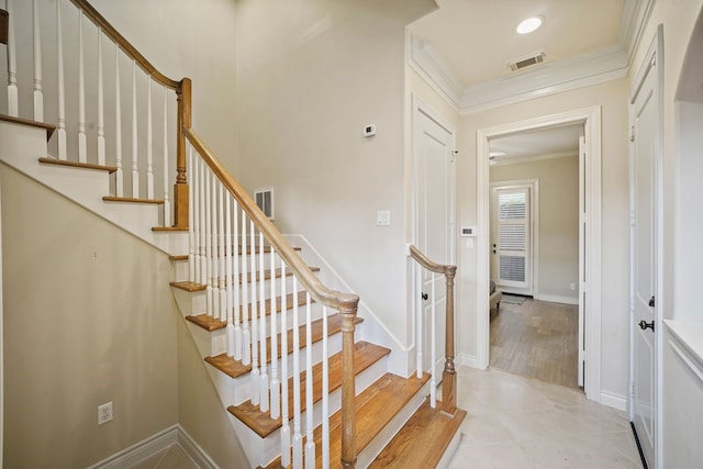 4009 Bellefontaine St, Houston, TX 77025 - staircase featuring ornamental molding and baseboards