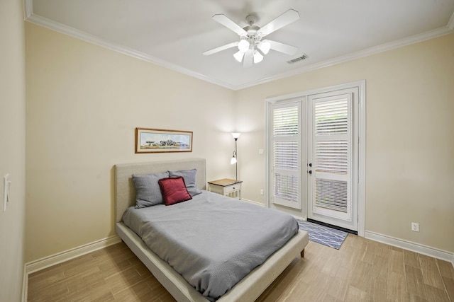 4009 Bellefontaine St, Houston, TX 77025 - bedroom with access to exterior, wood finished floors, crown molding, and ceiling fan