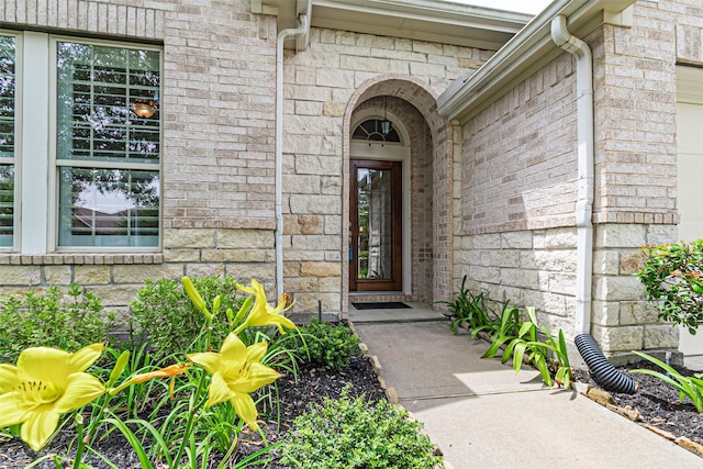 12610 Baldwin Springs Ct, Tomball, TX 77377 - property entrance with brick siding and stone siding