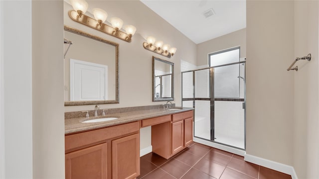 12610 Baldwin Springs Ct, Tomball, TX 77377 - bathroom featuring double vanity, a stall shower, and tile patterned flooring