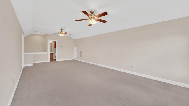 12610 Baldwin Springs Ct, Tomball, TX 77377 - carpeted empty room featuring vaulted ceiling and a ceiling fan