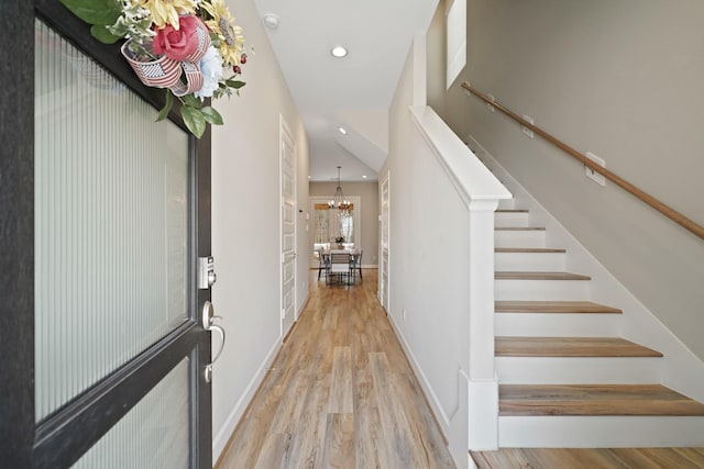 911 W 35th St Unit C, Houston, TX 77018 - entryway featuring wood finished floors, a chandelier, recessed lighting, and stairway