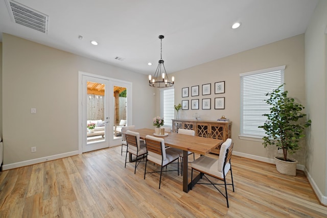 911 W 35th St Unit C, Houston, TX 77018 - dining space with a chandelier, recessed lighting, light wood finished floors, and french doors