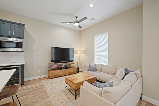 911 W 35th St Unit C, Houston, TX 77018 - living area featuring light wood-style flooring, ceiling fan, recessed lighting, and wine cooler