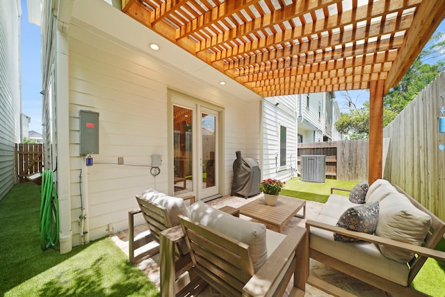 911 W 35th St Unit C, Houston, TX 77018 - fenced backyard with a grill, an outdoor living space, a pergola, and french doors
