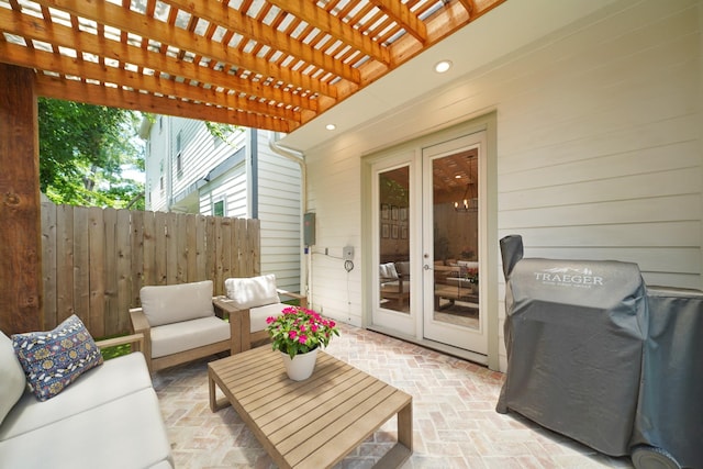 911 W 35th St Unit C, Houston, TX 77018 - view of patio featuring french doors, a pergola, an outdoor living space, and a grill