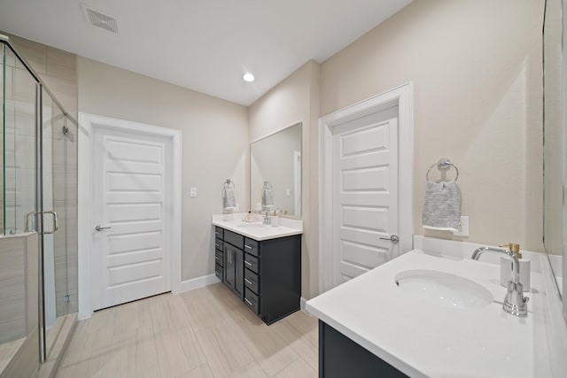 911 W 35th St Unit C, Houston, TX 77018 - full bathroom with vanity, a stall shower, and recessed lighting