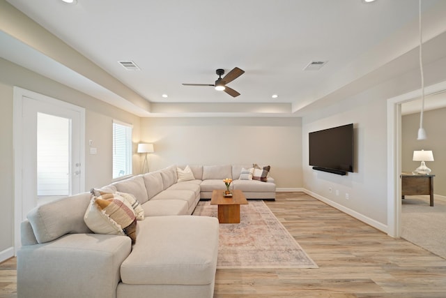 911 W 35th St Unit C, Houston, TX 77018 - living area featuring recessed lighting, light wood-style flooring, ceiling fan, and a raised ceiling