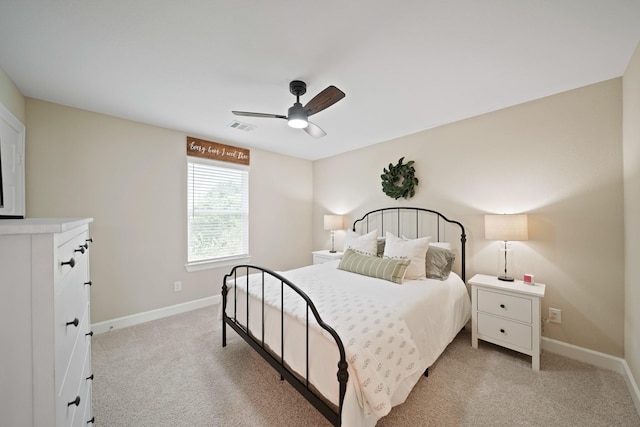 911 W 35th St Unit C, Houston, TX 77018 - bedroom featuring light carpet and a ceiling fan
