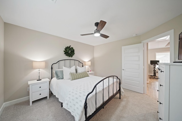 911 W 35th St Unit C, Houston, TX 77018 - bedroom featuring light carpet and ceiling fan