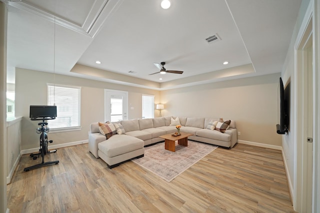 911 W 35th St Unit C, Houston, TX 77018 - living area featuring a raised ceiling, attic access, light wood-style flooring, a ceiling fan, and recessed lighting