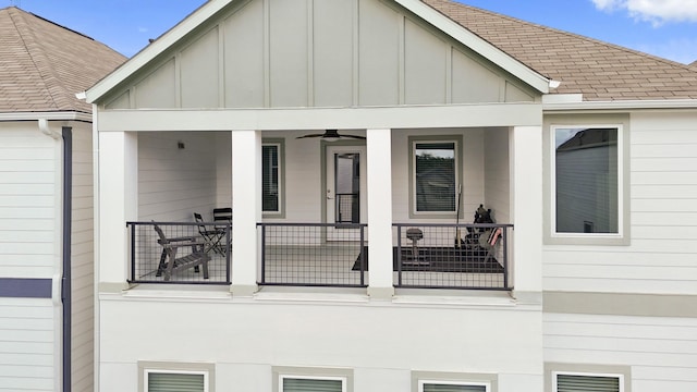 911 W 35th St Unit C, Houston, TX 77018 - view of home's exterior with board and batten siding and a ceiling fan