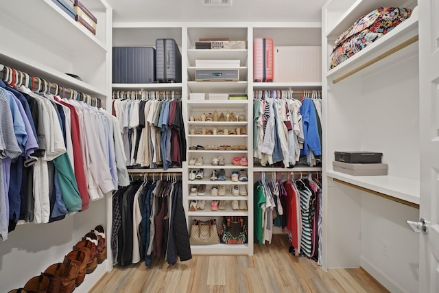 911 W 35th St Unit C, Houston, TX 77018 - spacious closet with wood finished floors