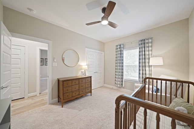 911 W 35th St Unit C, Houston, TX 77018 - carpeted bedroom with baseboards and ceiling fan