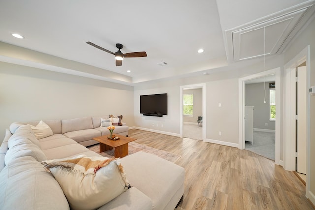 911 W 35th St Unit C, Houston, TX 77018 - living area with attic access, light wood-style flooring, ceiling fan, recessed lighting, and a raised ceiling