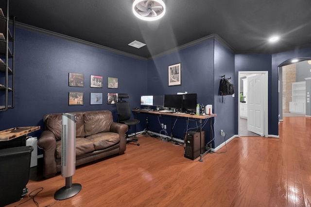 11304 Monarchs Way, Montgomery, TX 77316 - office area with wood finished floors, ornamental molding, arched walkways, and recessed lighting