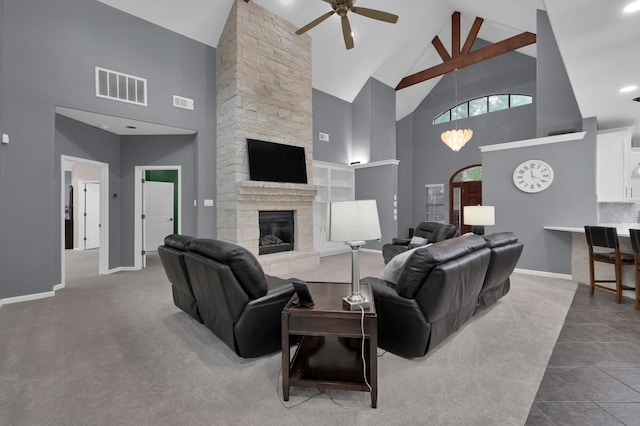11304 Monarchs Way, Montgomery, TX 77316 - carpeted living area with high vaulted ceiling, a ceiling fan, a fireplace, and tile patterned floors