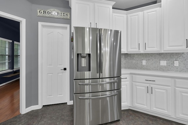 11304 Monarchs Way, Montgomery, TX 77316 - kitchen with stainless steel refrigerator with ice dispenser, white cabinets, and light countertops