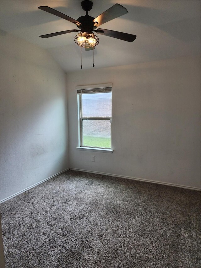 20390 Tembec Dr, New Caney, TX 77357 - spare room featuring carpet floors, ceiling fan, and lofted ceiling