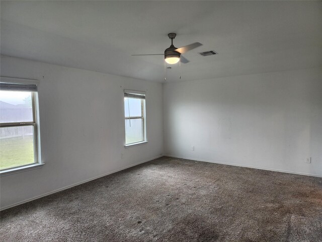 20390 Tembec Dr, New Caney, TX 77357 - carpeted spare room featuring ceiling fan and baseboards